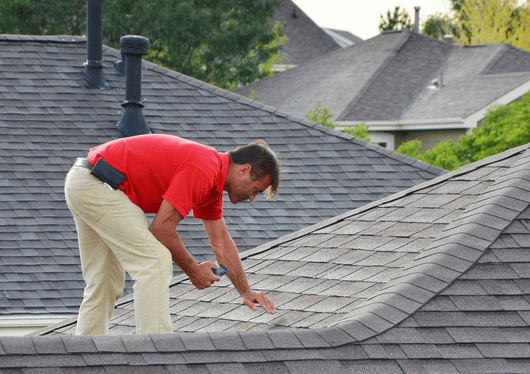 Man Doing Roof Inspection