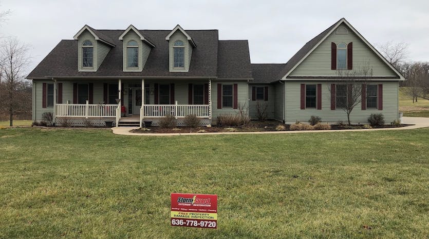 elegant home with high quality roofing repaired by stormguard st louis residential roofing team